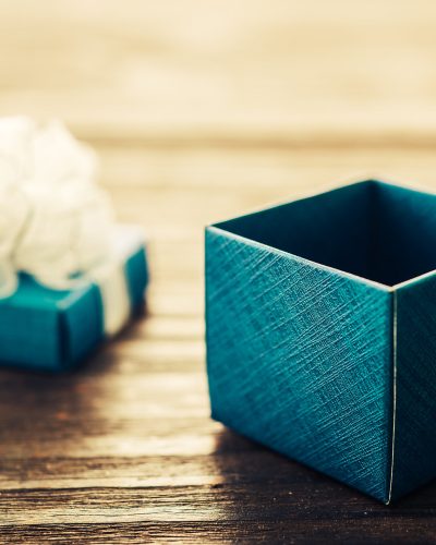 Gift box on wood background - vintage effect style pictures